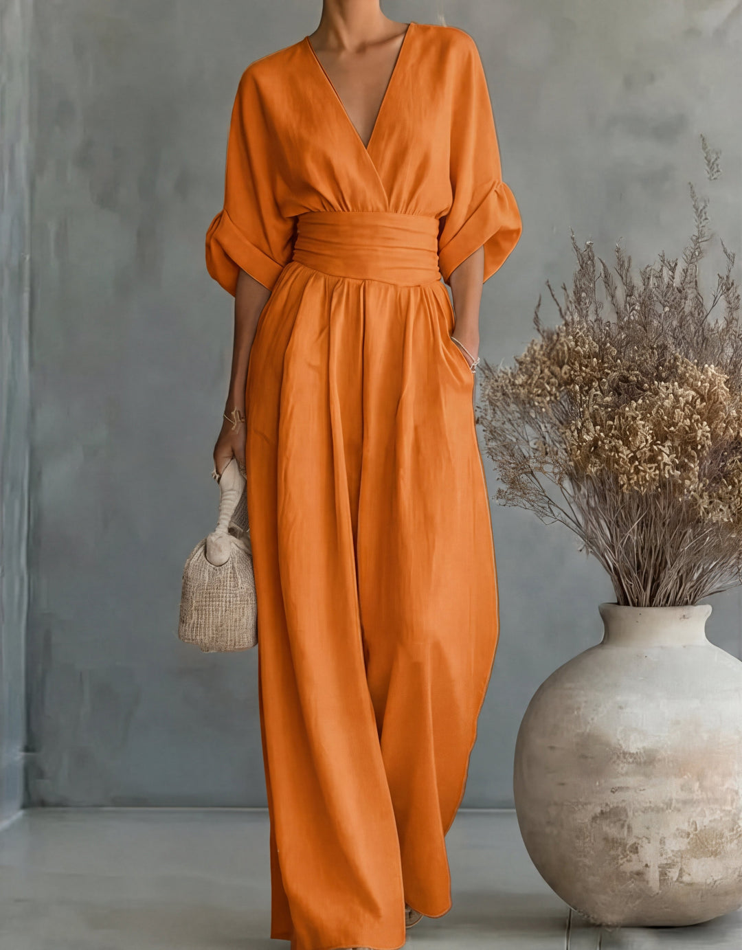 Elegante jumpsuit met V-hals en wijde pijpen