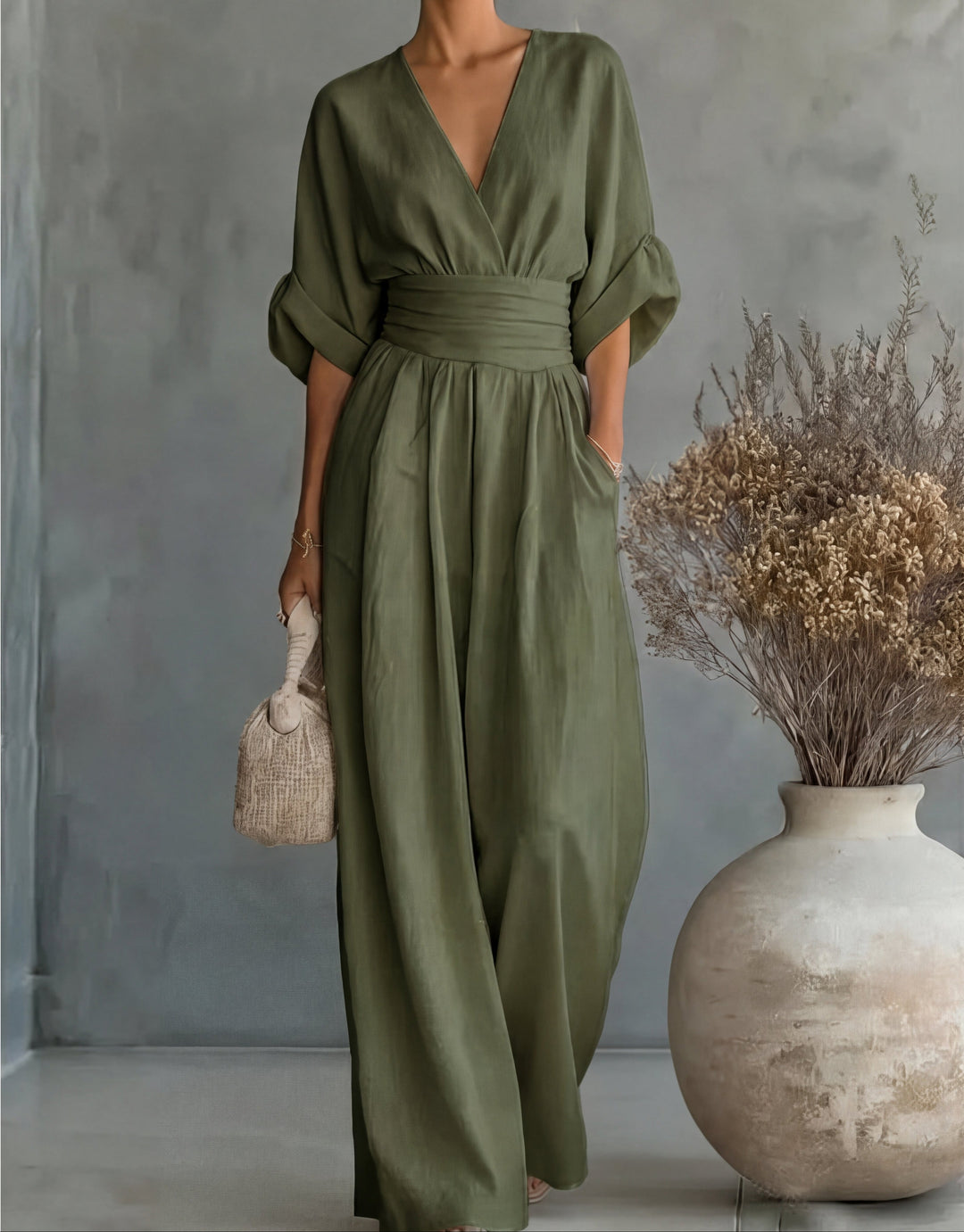 Elegante jumpsuit met V-hals en wijde pijpen
