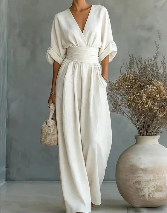 Elegante jumpsuit met V-hals en wijde pijpen